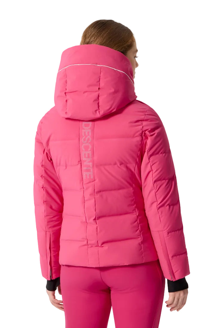 Rear view of a fuschia pink Descente Women’s Down Jacket featuring welded down baffles, a 4-way stretch Dermizax shell, an integrated storm hood, and a tailored silhouette.