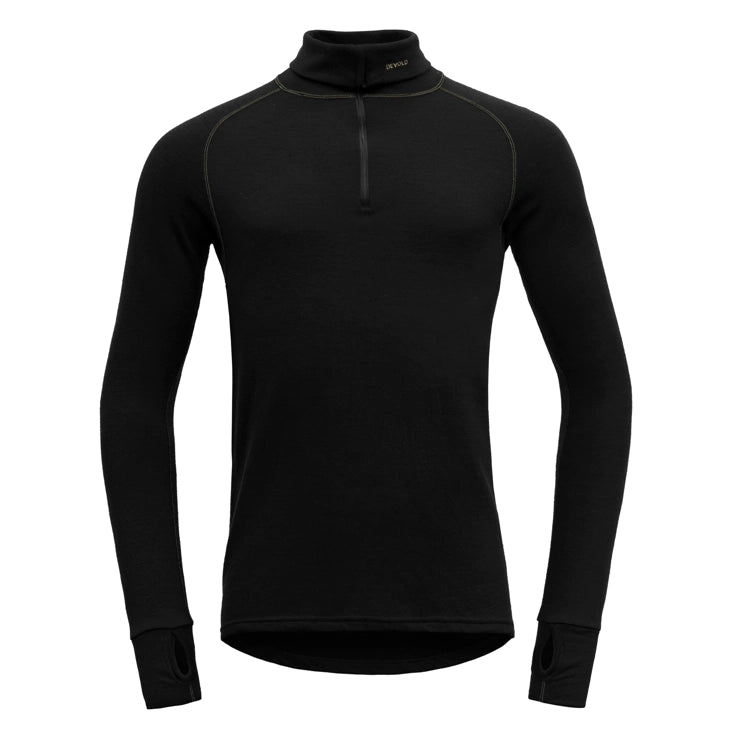 A black Devold Expedition Merino 235 Men’s Turtleneck Shirt that is made from moisture-wicking, lightweight, and warm merino wool.