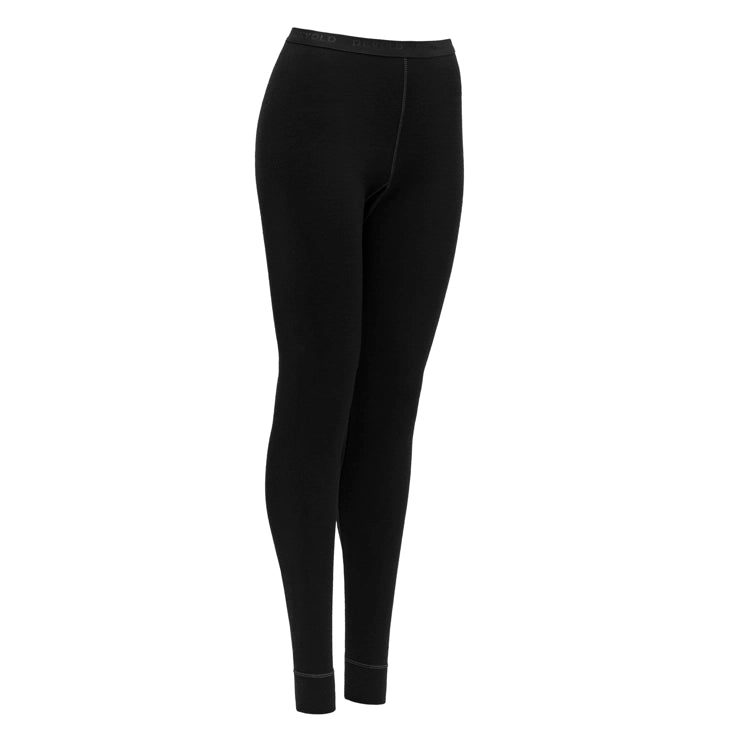 A pair of black Devold Women’s Expedition Merino 235 Long Johns that are made from moisture-wicking, lightweight, and warm merino wool.