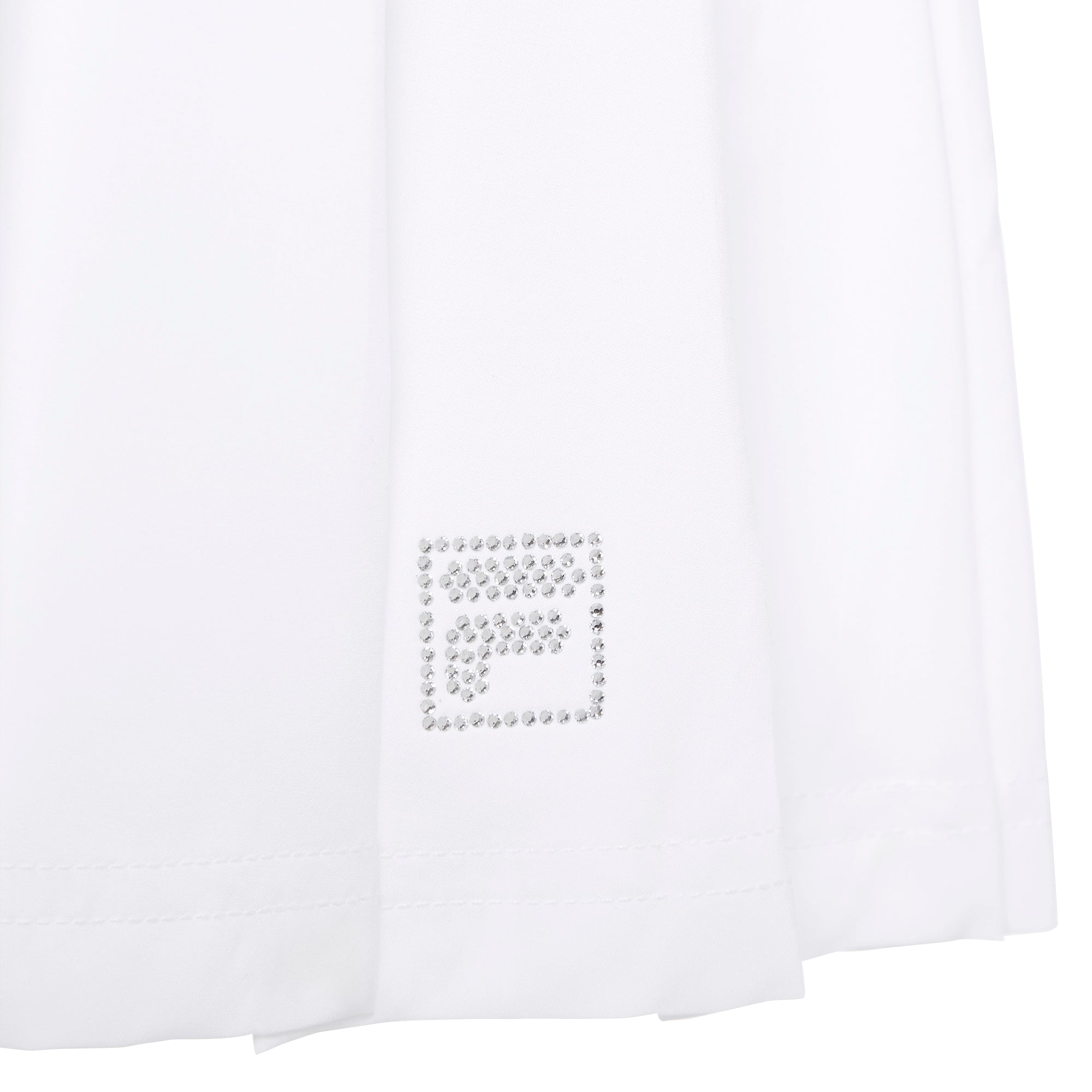 FILA Girls' Pleated Skort featuring lightweight performance fabric, built-in shorts, classic pleats, and an athletic fit.