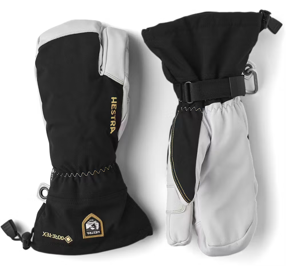 A pair of Hestra Army Leather GORE-TEX 3-Finger Gloves that feature a waterproof membrane and are made from premium leather.