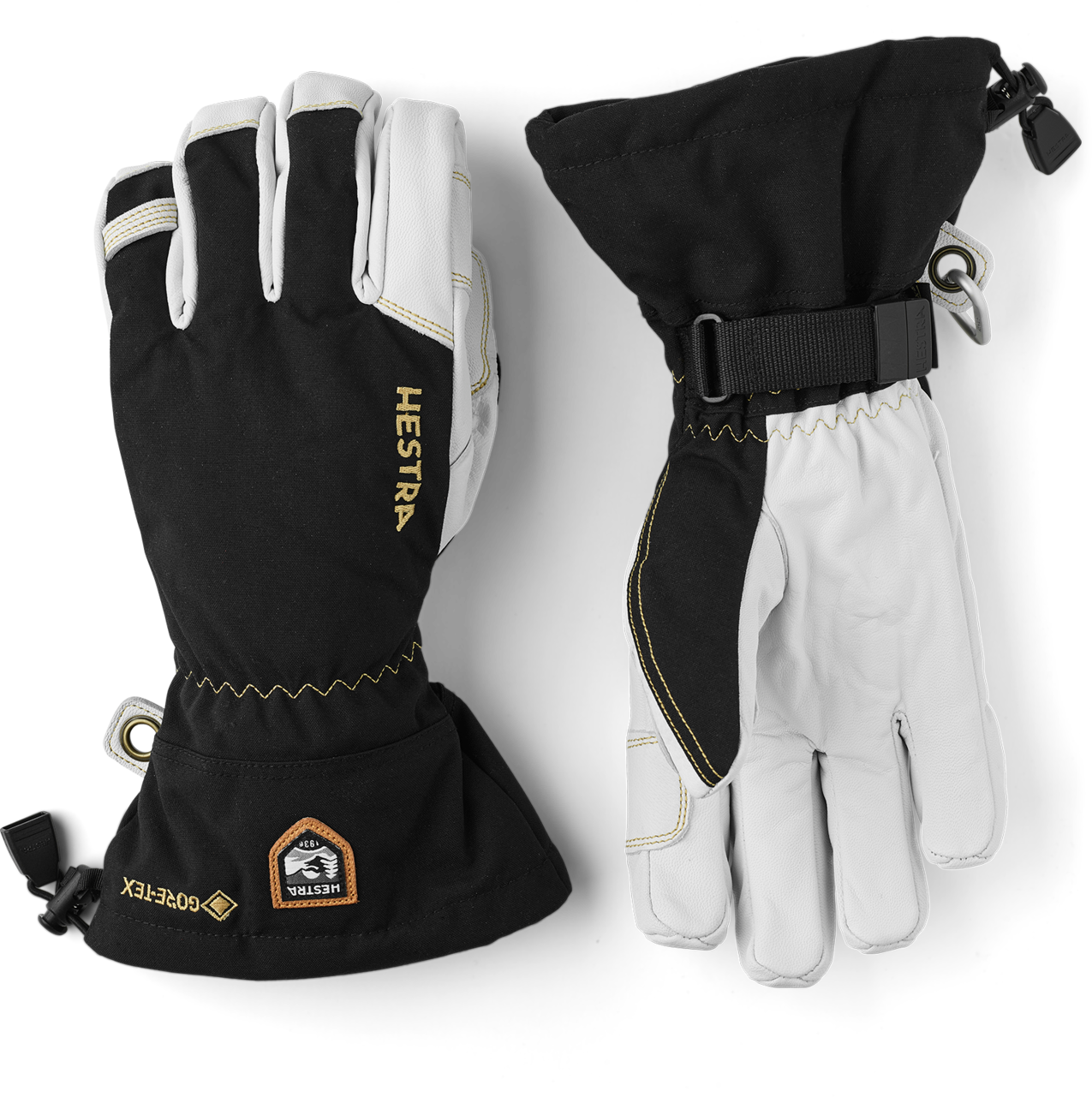 A pair of black and white Hestra Army Leather Gore-Tex gloves, which are designed to keep your hands warm and dry in harsh winter conditions.