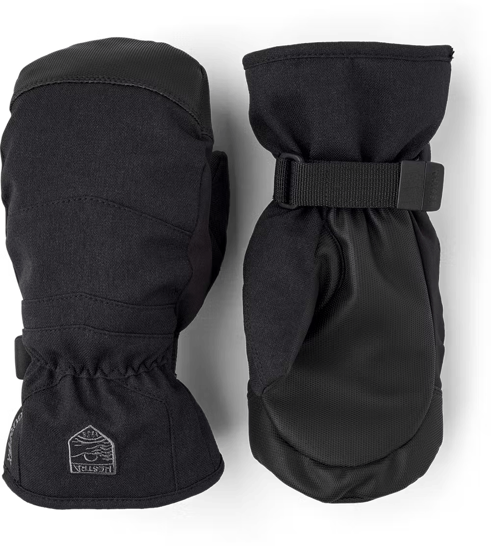 A pair of Hestra Jr Atlas GORE-TEX Mittens that are designed to keep your child's hands warm and dry all day in harsh winter conditions