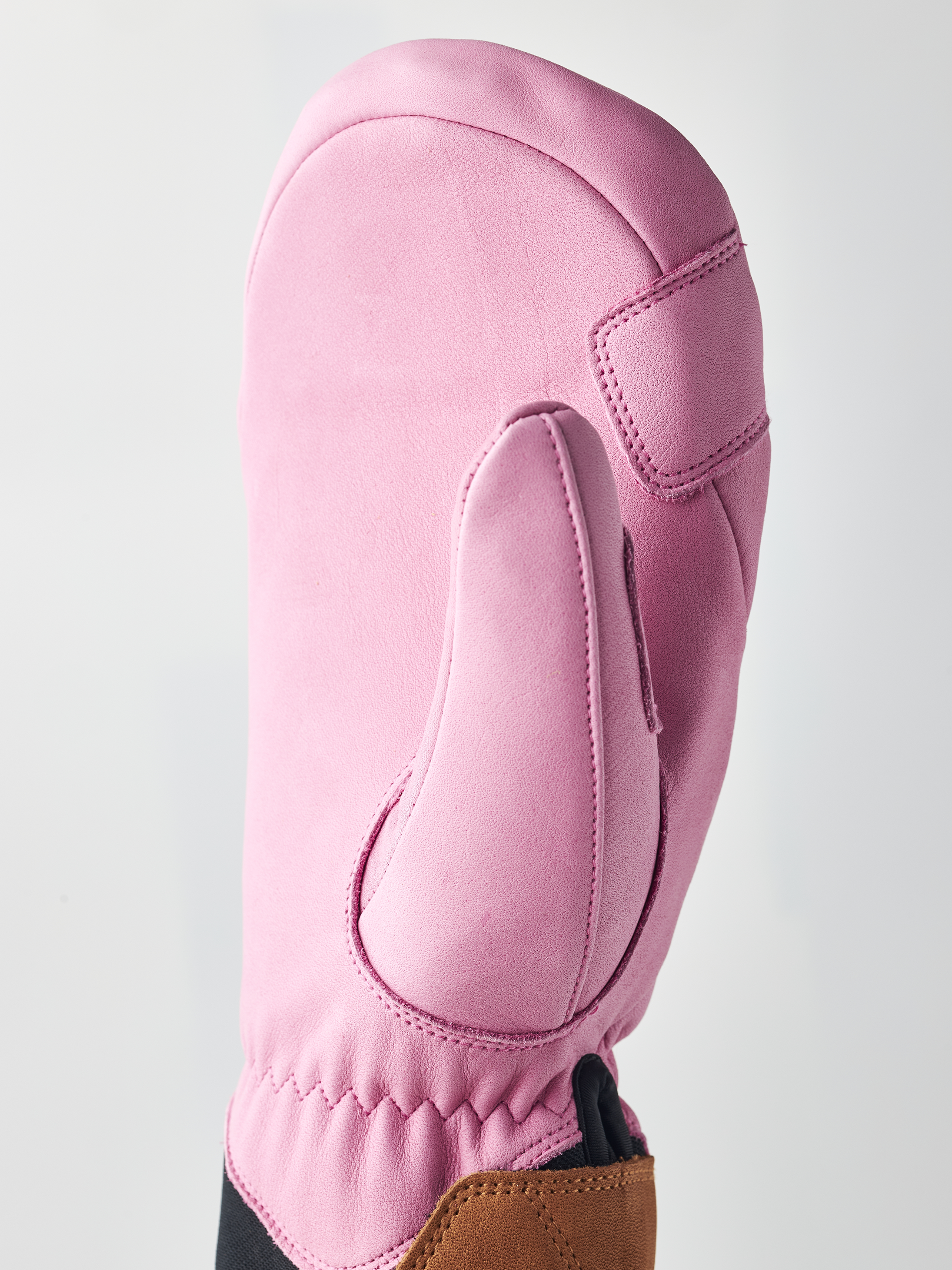 A pair of pink Hestra Women's Fall Line premium leather mittens.