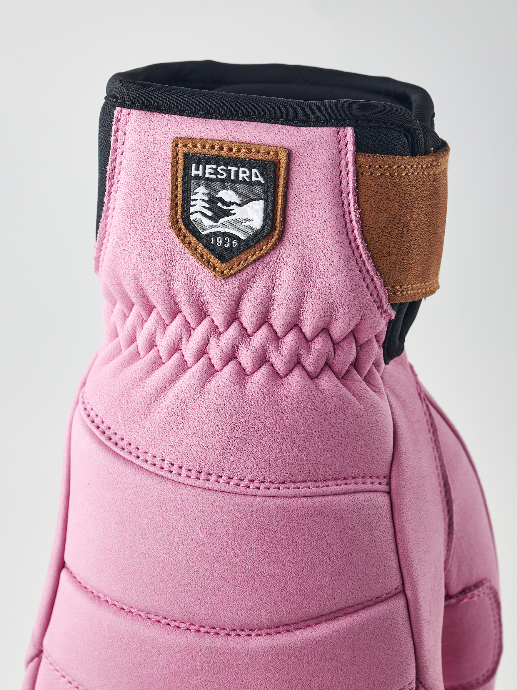 A pair of pink Hestra Women's Fall Line premium leather mittens.