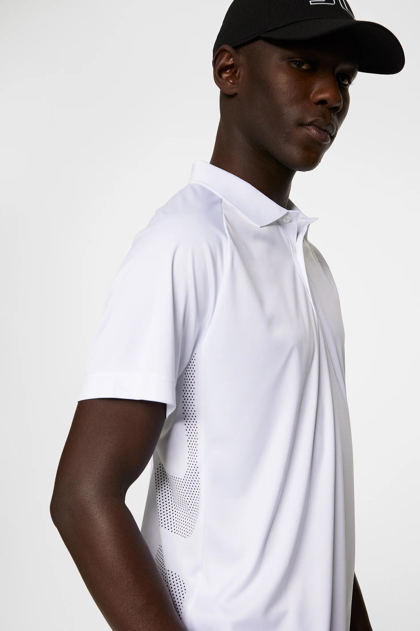 J.Lindeberg Men's Sola golf polo with breathable stretch performance fabric and athletic fit for golf and everyday wear