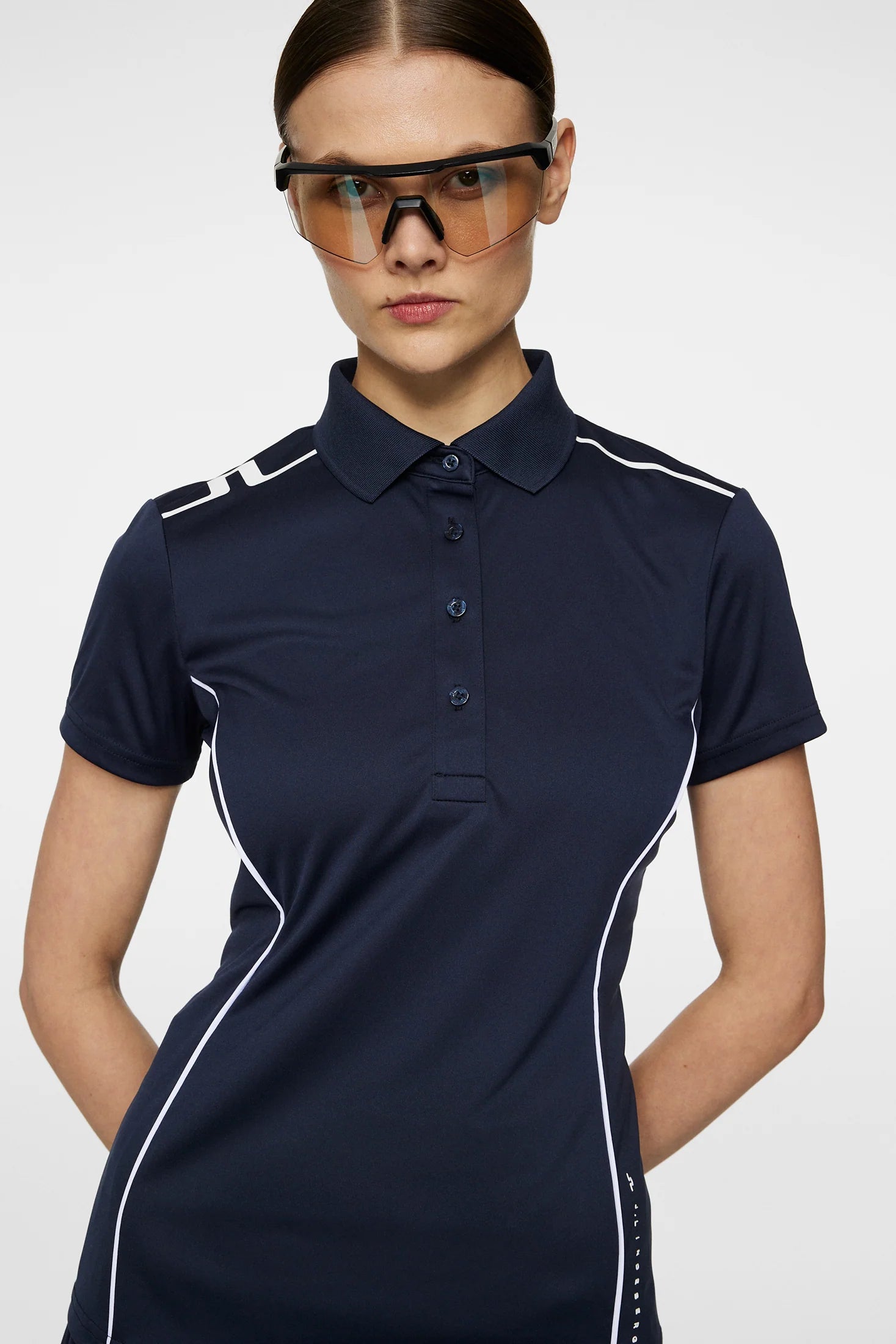 J.Lindeberg Women's Leyla golf polo with breathable stretch performance fabric and flattering athletic fit for golf and resort wear