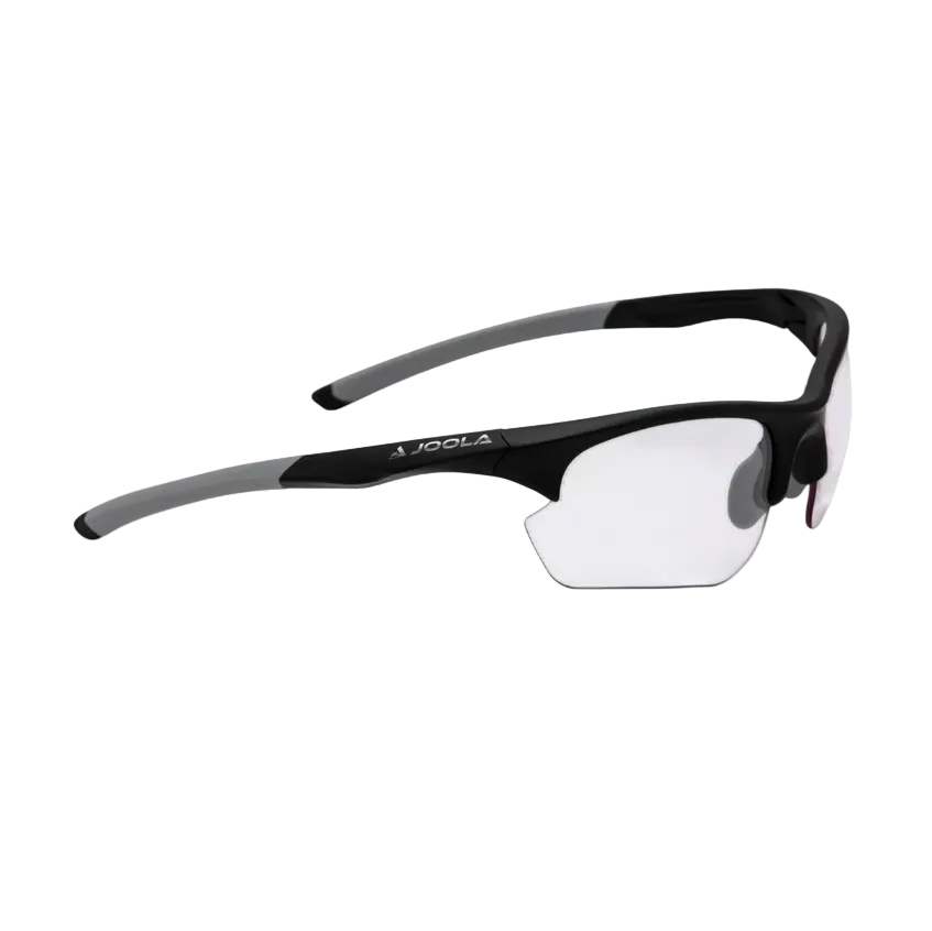 A pair of black Joola RJX Boost Eyewear featuring clear lenses that is designed to be worn when playing pickleball.