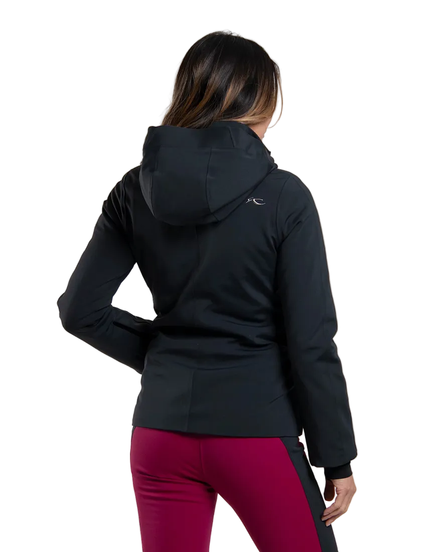 Rear view of a black Kjus Women’s Formula Jacket featuring 4-way stretch waterproof fabric, Fast Thermo Core insulation, water-repellent zippers, AC-Vent forearm ports, and a detachable helmet-compatible hood.