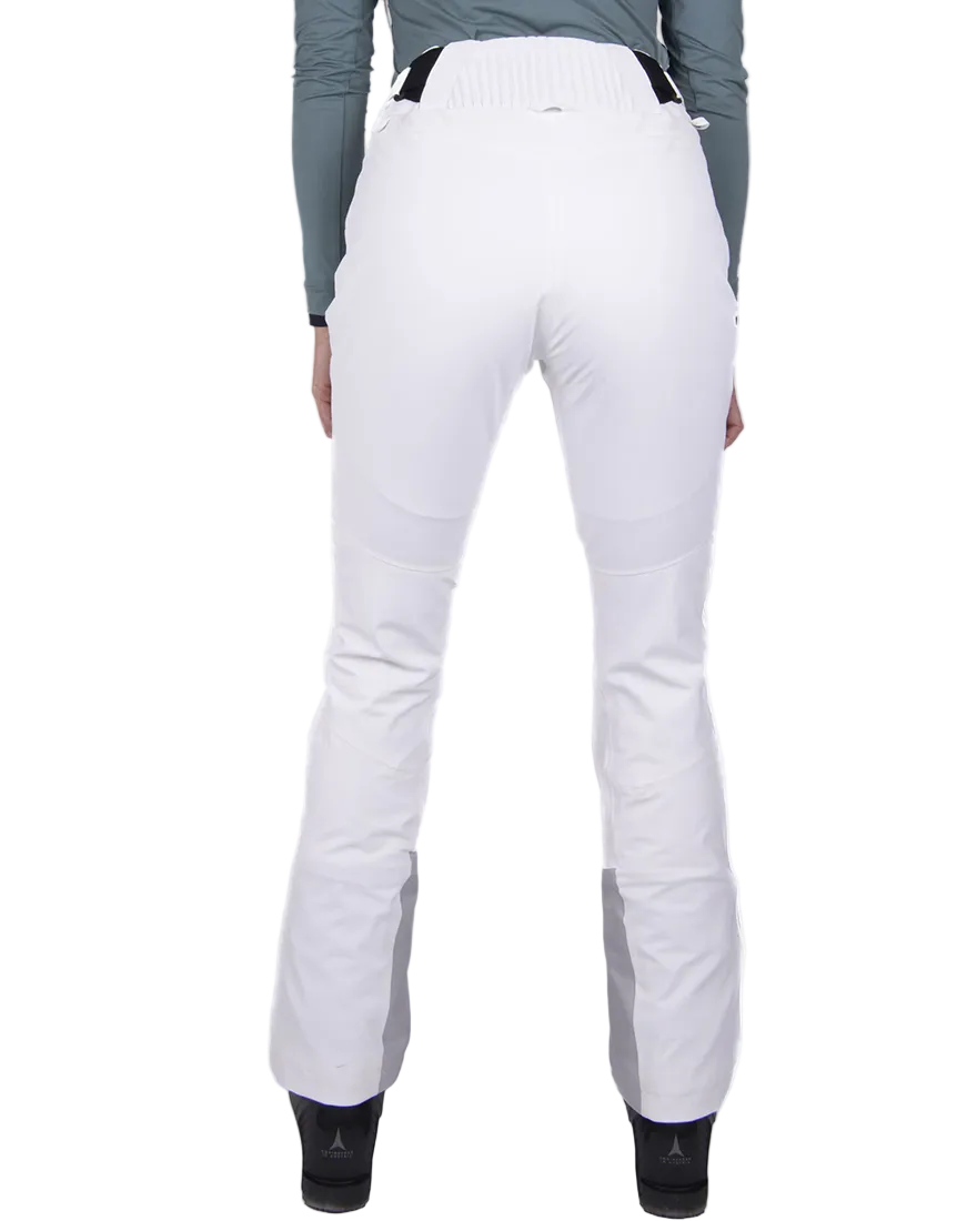Rear view of white Kjus Women’s Formula Pants featuring 4-way stretch waterproof fabric, Fast Thermo Core insulation, water-repellent zippers, and Schoeller Keprotec reinforced scuff guards.