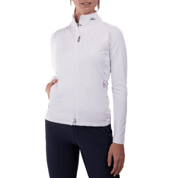 KJUS Women's Radiation Vest featuring lightweight synthetic insulation, stretch side panels, zippered pockets, and a women's-specific fit for skiing and winter layering.