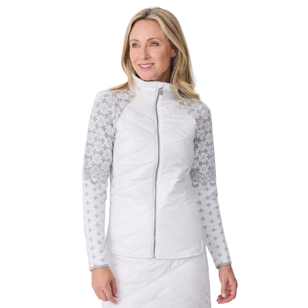 Front view of a white Krimson Klover Women’s Switchback Sierra Jacket featuring a quilted insulated core, patterned knit stretch sleeves, full front zipper, and zippered hand pockets.