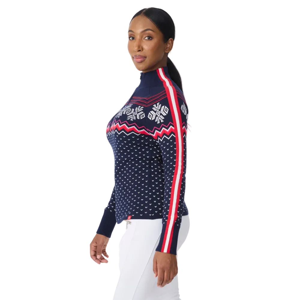 Side view of a navy Krimson Klover Women’s Snowhut 1/2 Zip Sweater featuring a technical four-way stretch knit, tall stand-up collar, deep half-zip front zipper, and flatlock seams.