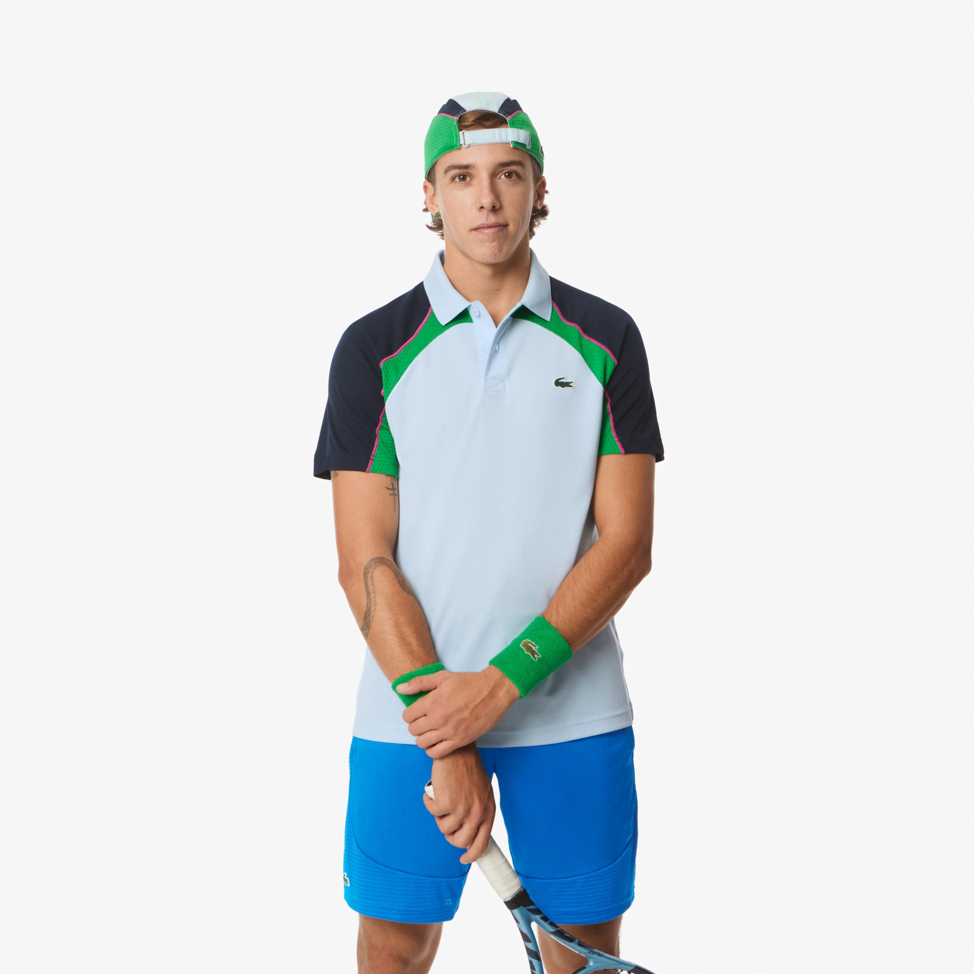 Lacoste Men's Ultra Dry Colorblock Tennis Polo featuring moisture-wicking performance fabric, colorblock detailing, athletic fit, and crocodile branding.