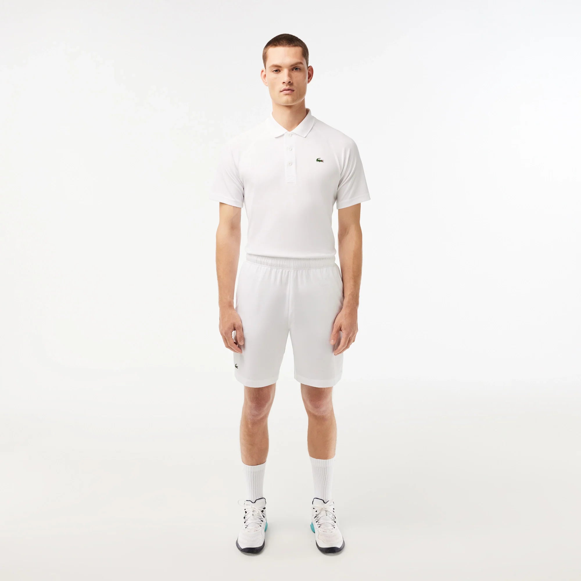 Lacoste Men's Ultralight Tennis Shorts featuring lightweight performance fabric, moisture management, side pockets, and an athletic fit.