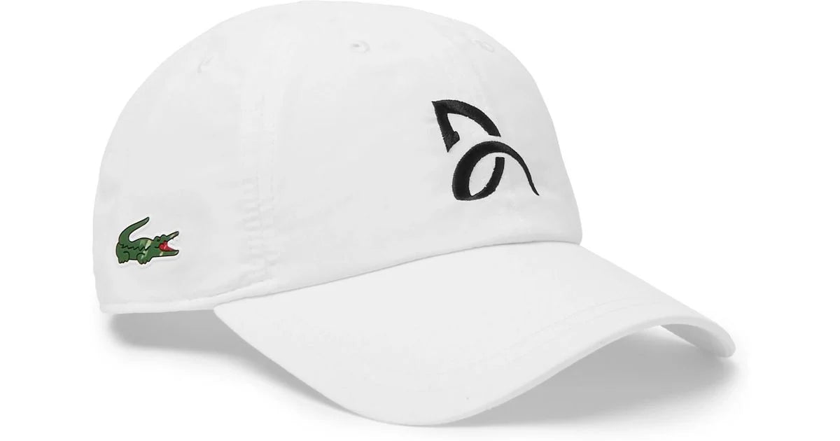 Lacoste Sport x Novak Djokovic Tennis Cap featuring lightweight performance fabric, an adjustable fit, curved brim, and signature tennis styling.