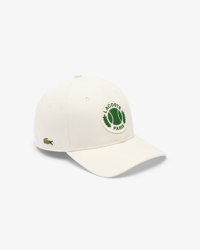 Lacoste Unisex Adjustable Twill Cap featuring durable twill fabric, an adjustable fit, curved brim, and embroidered crocodile logo.