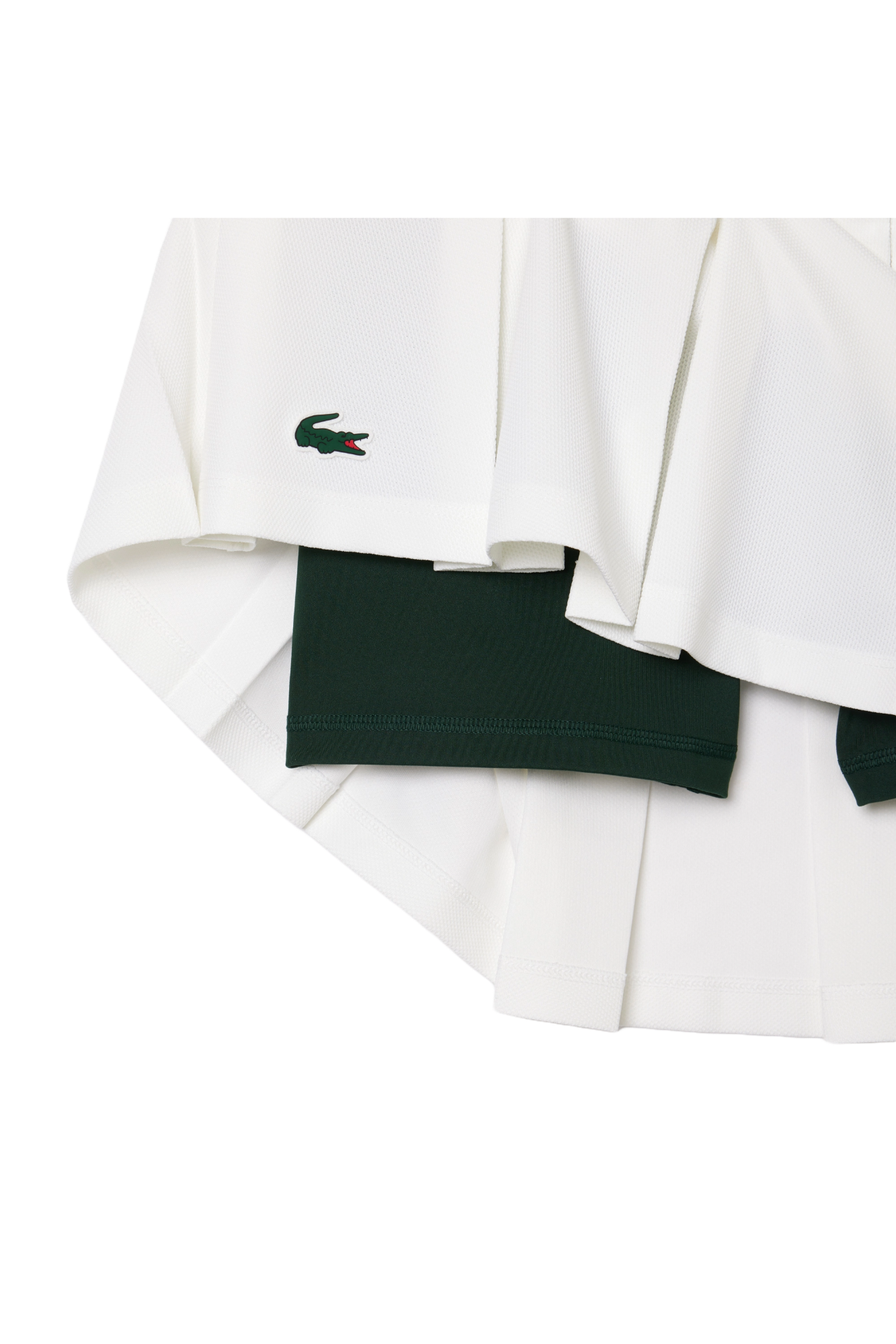 Lacoste Women's Piqué Sport Skirt with Built-In Tennis Shorts featuring breathable piqué fabric, integrated shorts, athletic fit, and crocodile branding.