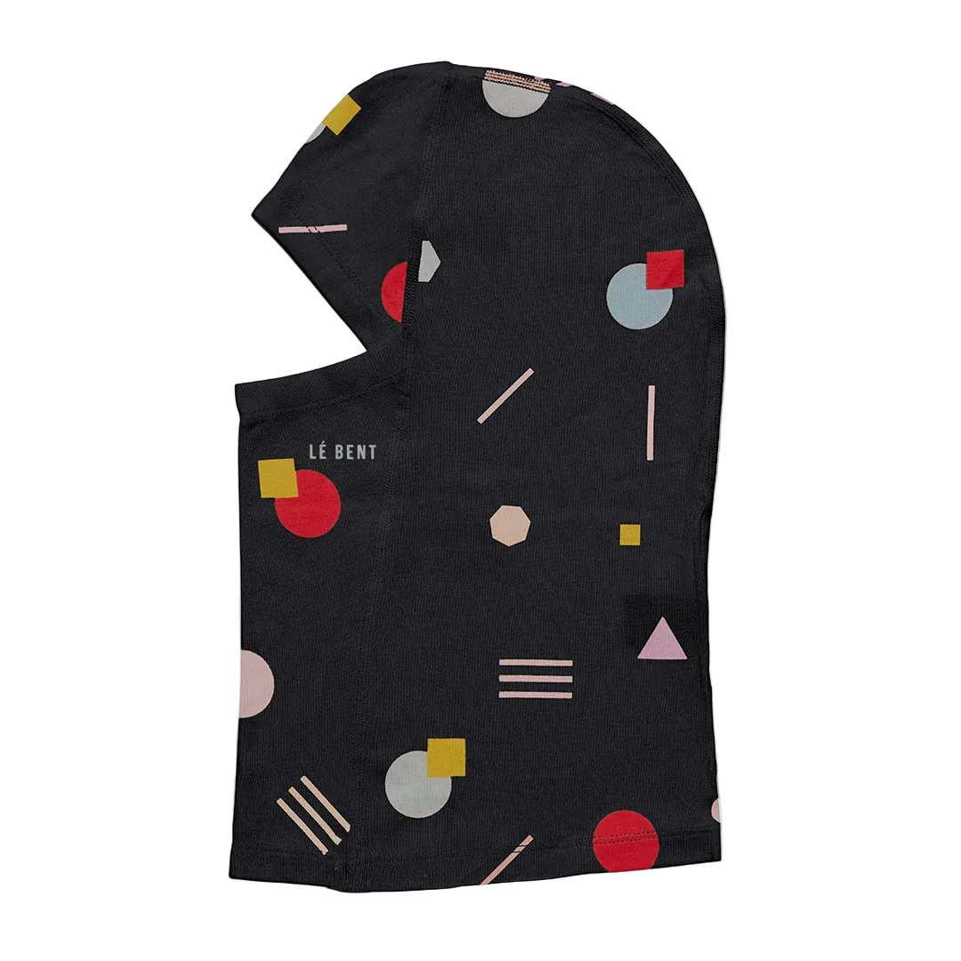 Side view of the Le Bent Jr Confetti Midweight Balaclava featuring a youth-specific fit, Merino wool and bamboo rayon blend, colorful confetti pattern, drop-chin hinge, and flatlock seams.