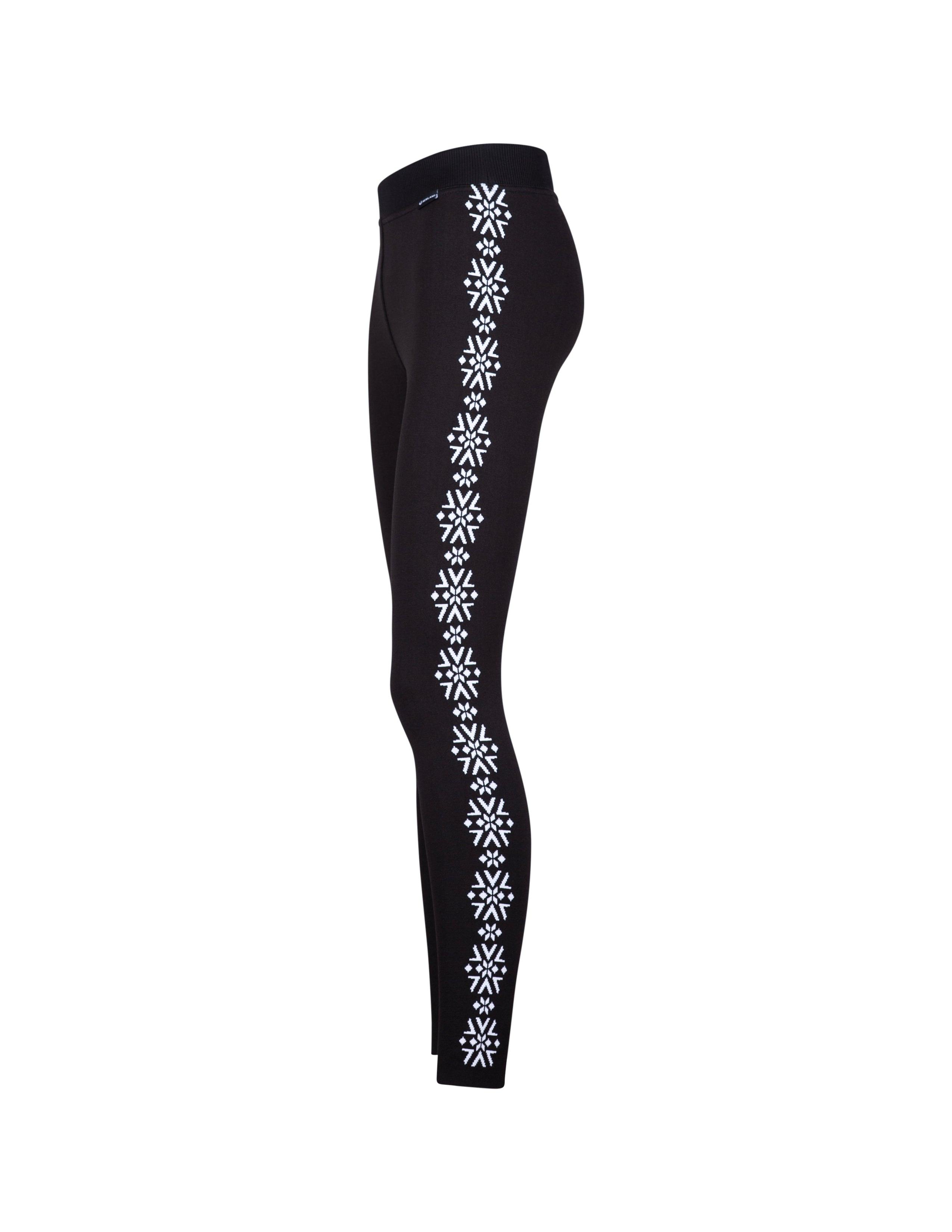 A pair of black Newland Women's Croix de Couer Leggings that feature a white snowflake pattern down the legs and are moisture-wicking, breathable, and stretchable.