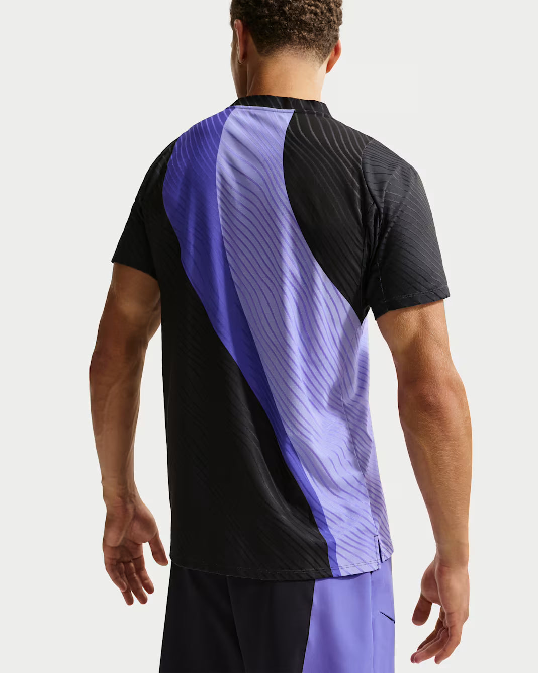 NikeCourt Slam Men's Dri-FIT Advantage Tennis Top featuring sweat-wicking performance fabric, breathable comfort, athletic fit, and court-ready styling.