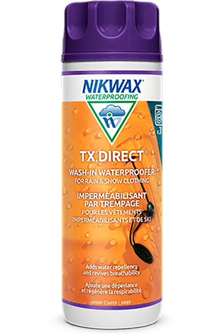 Front view of a 300ml bottle of Nikwax TX Direct Wash-In liquid DWR treatment featuring a screw-on cap and technical product labeling.