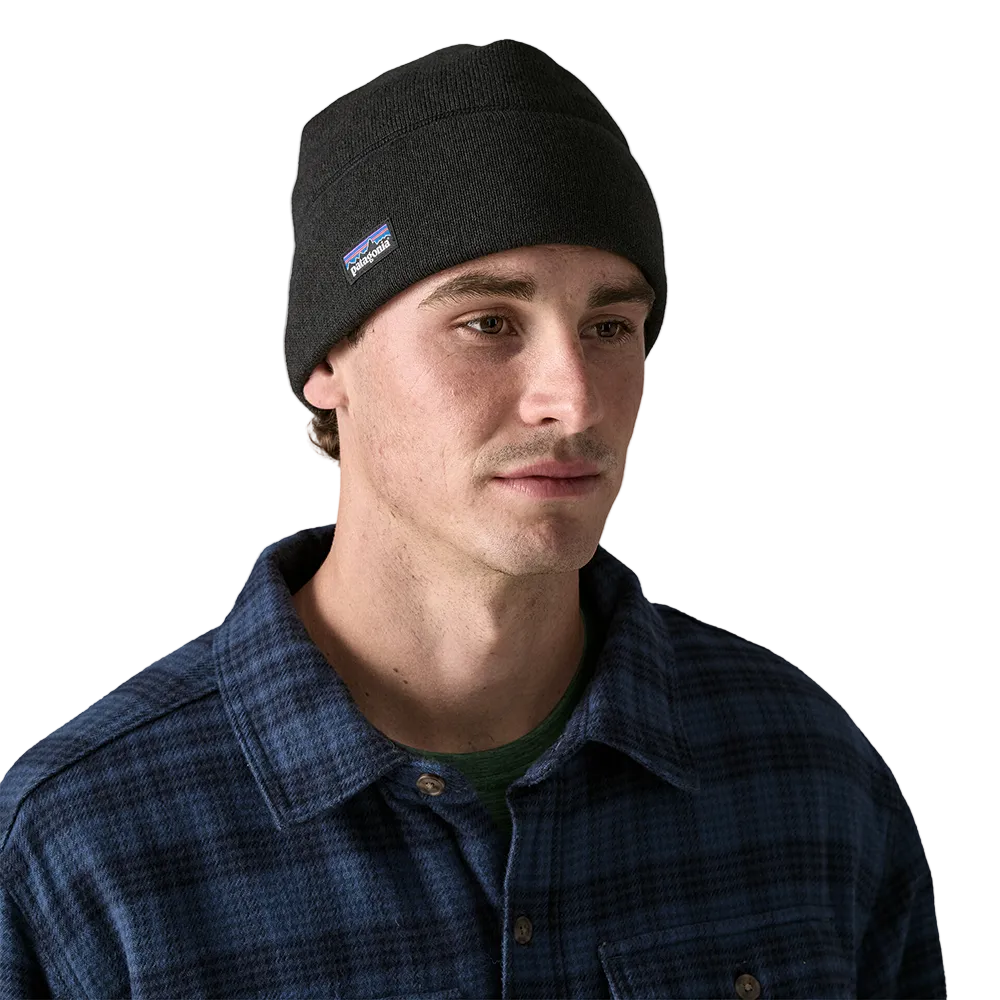Front view of a black Patagonia Better Sweater Beanie featuring 100% recycled polyester sweater-knit fleece fabric, a doubled cuff design, and a low-profile construction.
