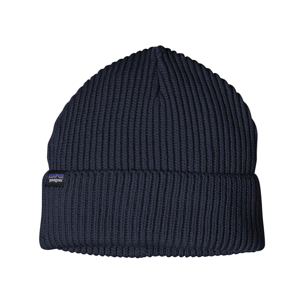 Front view of a navy blue Patagonia Fisherman's Rolled Beanie featuring 100% recycled polyester 1x1 rib-knit construction, an adjustable roll-up cuff, and a woven logo label.