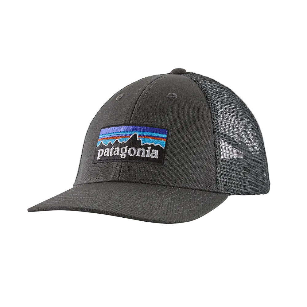 Front view of a forge grey Patagonia P-6 Logo LoPro Trucker Hat featuring an organic cotton canvas front crown, embroidered original artwork, NetPlus precurved brim, recycled polyester mesh back, and an adjustable rear snap closure.