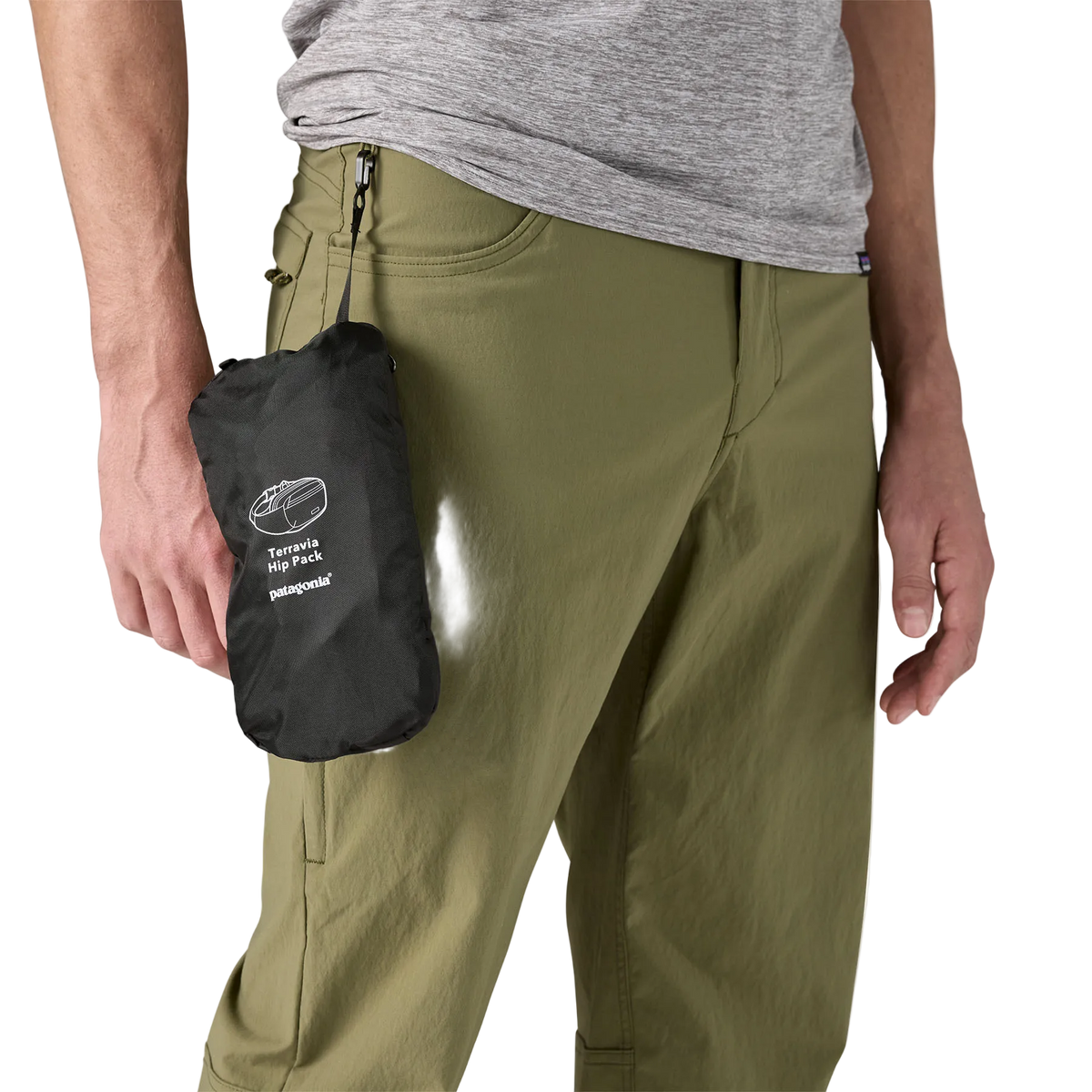 Front view of a black Patagonia Terravia Hip Pack featuring recycled nylon ripstop fabric, dual stretch-mesh water-bottle pockets, zippered main and front stash pockets, an airmesh back panel, and an adjustable webbed waist strap.