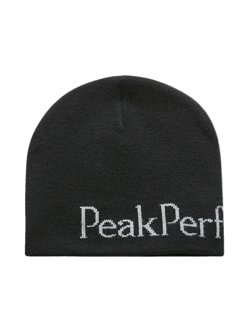 Front view of the Peak Performance Logo Hat featuring a soft double-layer knitted construction, fold-up cuff, stretch fit, and an embroidered front logo.