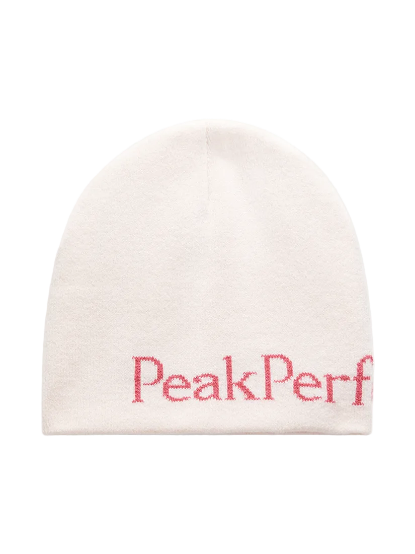 Front view of the Peak Performance Logo Hat featuring a soft double-layer knitted construction, fold-up cuff, stretch fit, and an embroidered front logo.