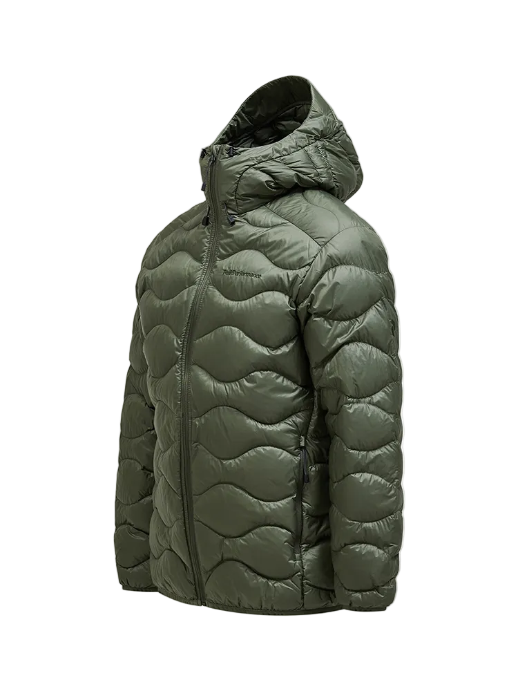 Side view of a pine needle green Peak Performance Men's Helium Down Hooded Jacket featuring ultra-lightweight windproof fabric, signature wave quilting, 700-fill-power down insulation, and an elasticated fixed hood.