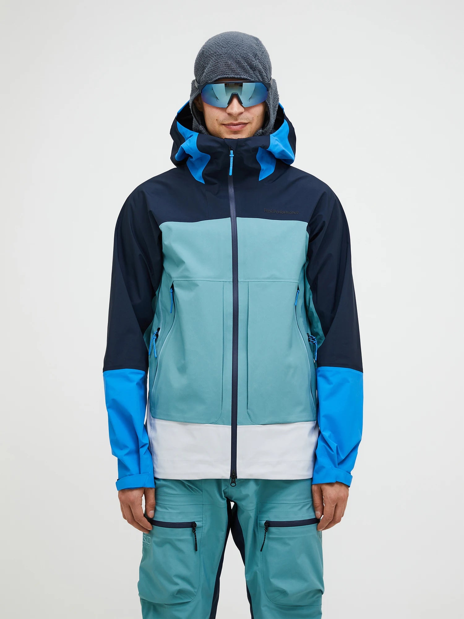 Peak Performance Men's Vislight GORE-TEX C-KNIT Ski Jacket featuring waterproof GORE-TEX C-KNIT™ construction, helmet-compatible hood, and lightweight alpine performance.