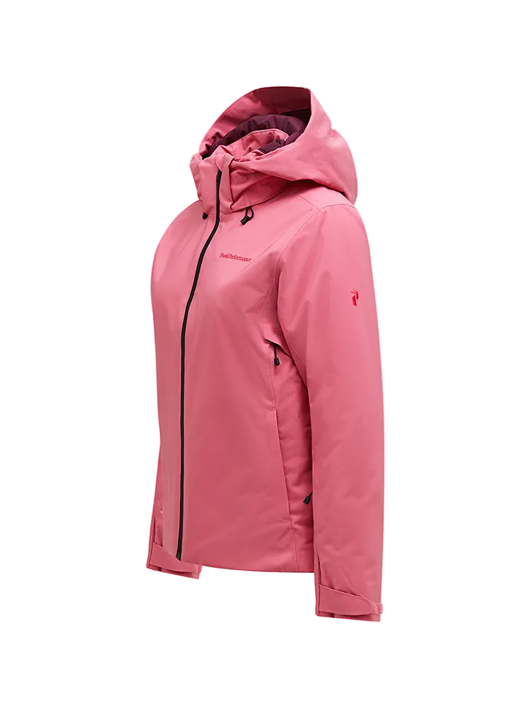 Side view of a mountain blush pink Peak Performance Women's Anima HIPE 2L Insulated Shell Jacket featuring 2-layer HIPE 2-way stretch fabric, YKK AquaGuard storm zippers, a 2-way adjustable helmet-compatible hood, and zippered underarm vents.