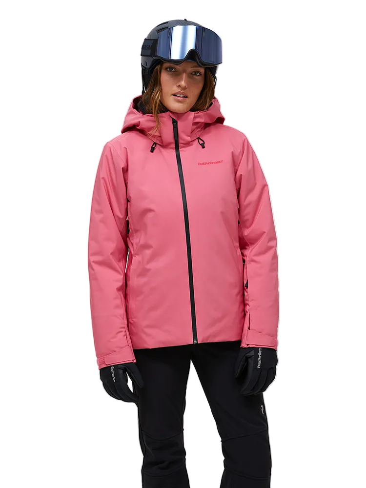 Front view of a mountain blush pink Peak Performance Women's Anima HIPE 2L Insulated Shell Jacket featuring 2-layer HIPE 2-way stretch fabric, YKK AquaGuard storm zippers, a 2-way adjustable helmet-compatible hood, and zippered underarm vents.