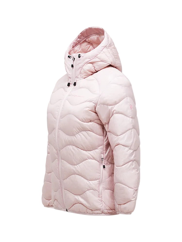 Side view of a frosted blossom pink Peak Performance Women's Helium Down Hooded Jacket featuring ultra-lightweight windproof fabric, signature wave quilting, 700-fill-power down insulation, and an elasticated fixed hood