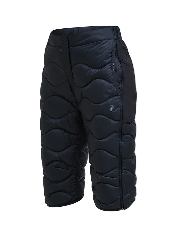 Side view of black Peak Performance Women's Helium Down Shorts featuring ultra-lightweight windproof fabric, signature wave quilting, 700-fill-power down insulation, and a low-profile elastic waistband.