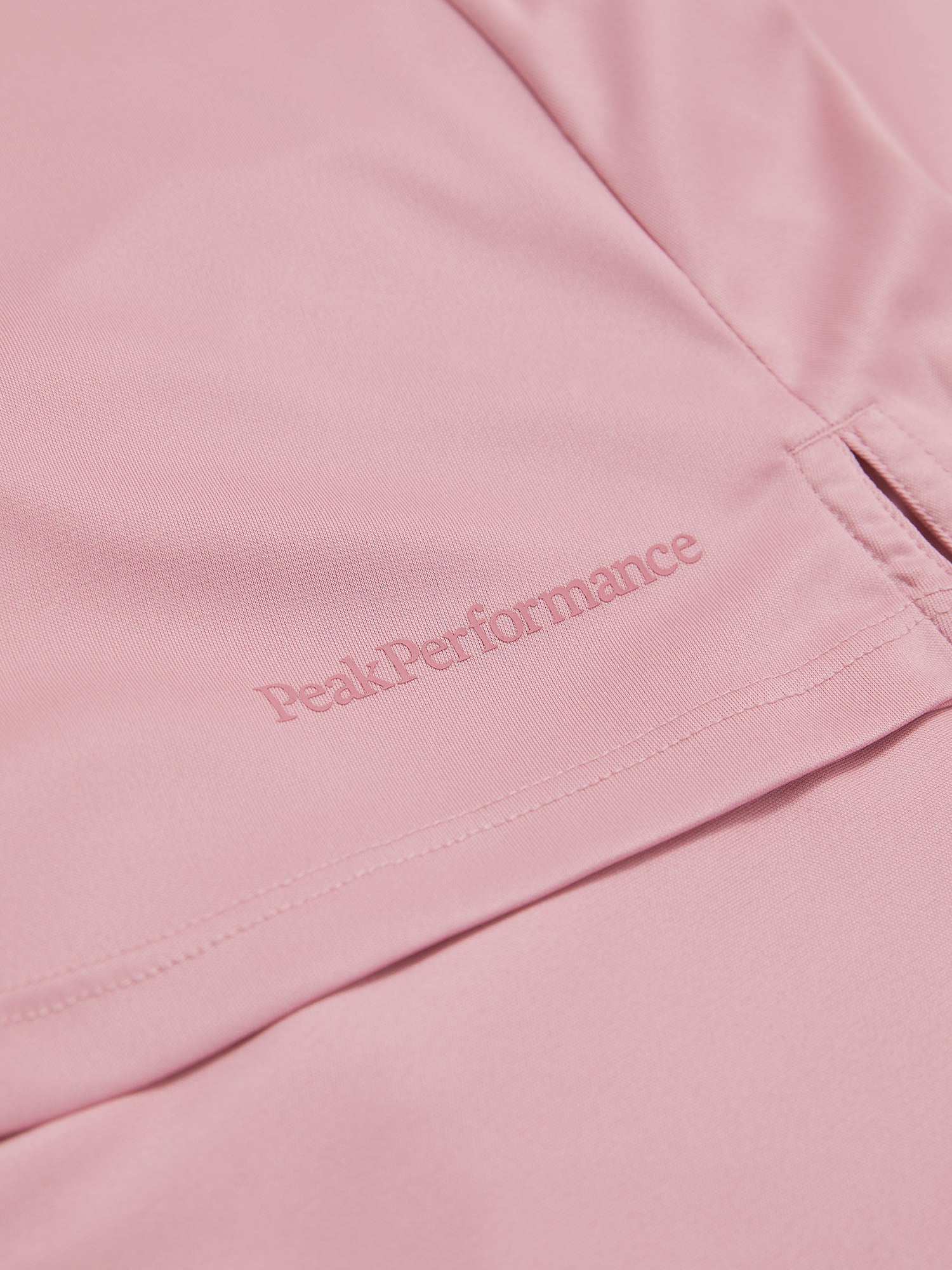 Peak Performance Women's Player Golf Skirt featuring lightweight stretch fabric, built-in shorts, and a flattering athletic fit.