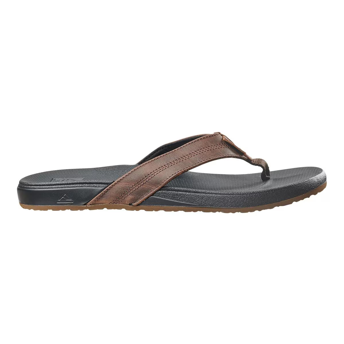 A black and brown Reef Mens Cushion Bounce Phantom LE flip-flop sandal on a white background