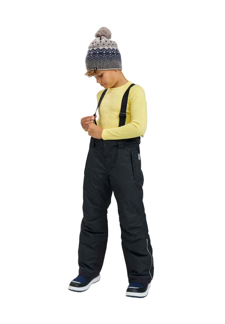 Front view of black Reima Jr Wingon Pants featuring a waterproof Reimatec shell, detachable elastic suspenders, reinforced knee and hem panels, and zippered hand pockets.