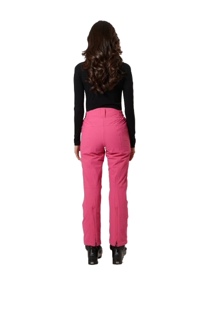 A woman wearing a pair of pink RH+ Women's Slim Ski Pants that are waterproof, breathable, stretchable, and insulated.