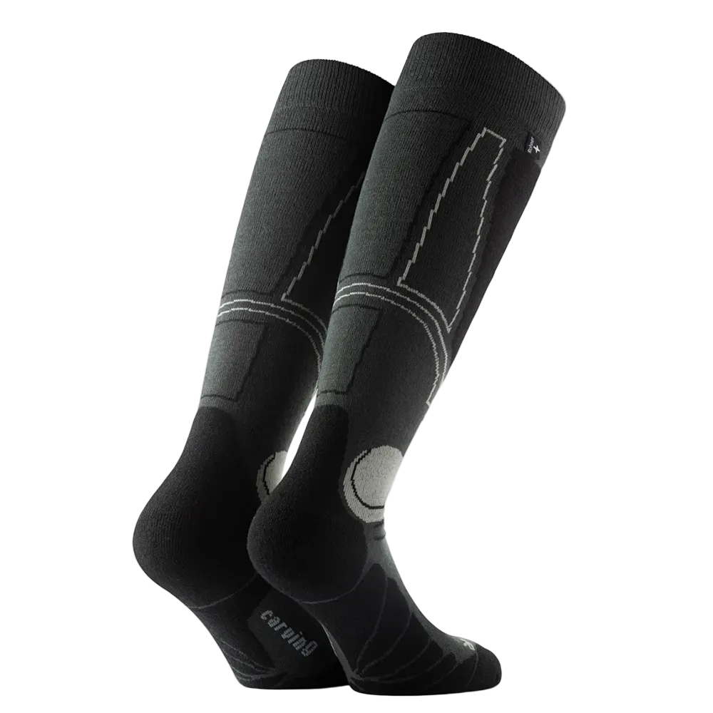 Anatomical L/R-specific Rohner Carving Socks featuring over-the-calf height, targeted shin and ankle cushion zones, footbed ventilation channels, and seamless toe knit construction.