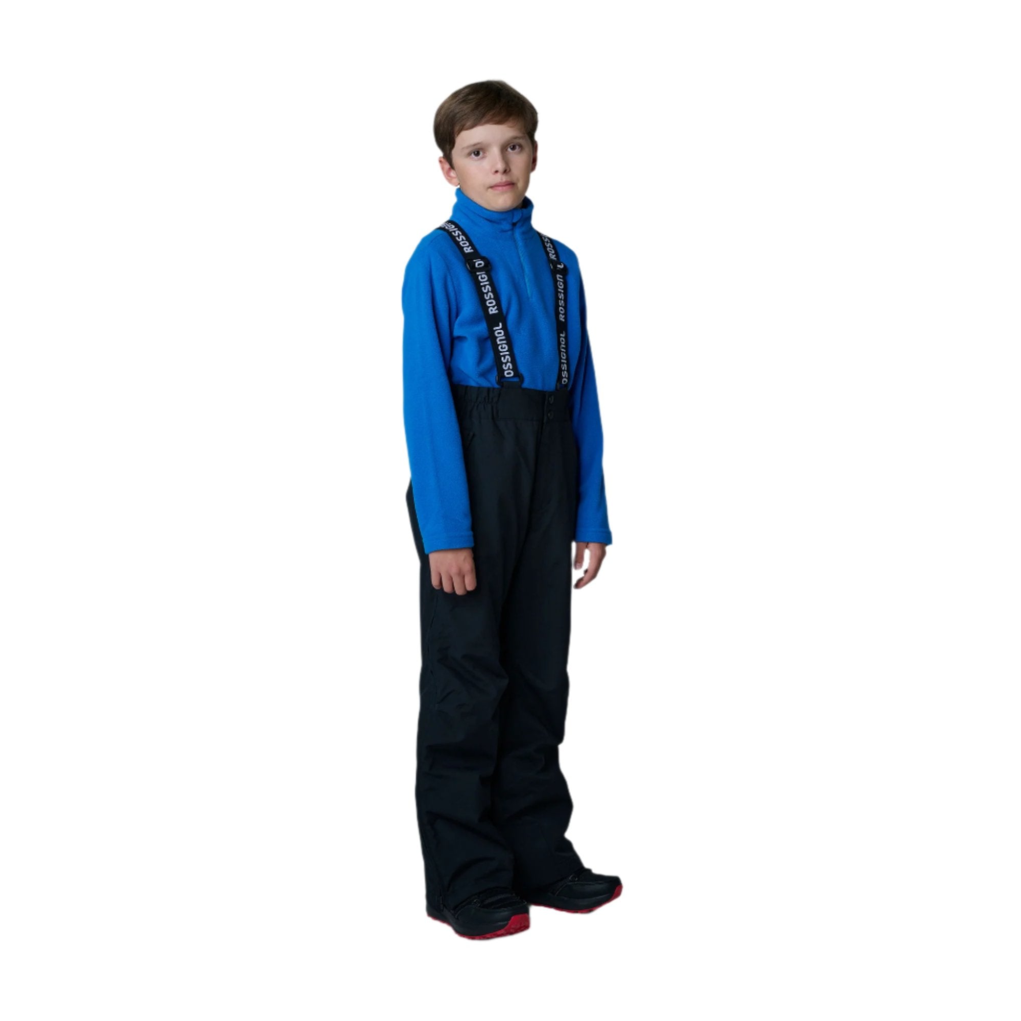 Rossignol JR Full Zip Ski Race Pants featuring lightweight insulation, full-length side zippers, weather-resistant construction, and a junior race-specific fit.