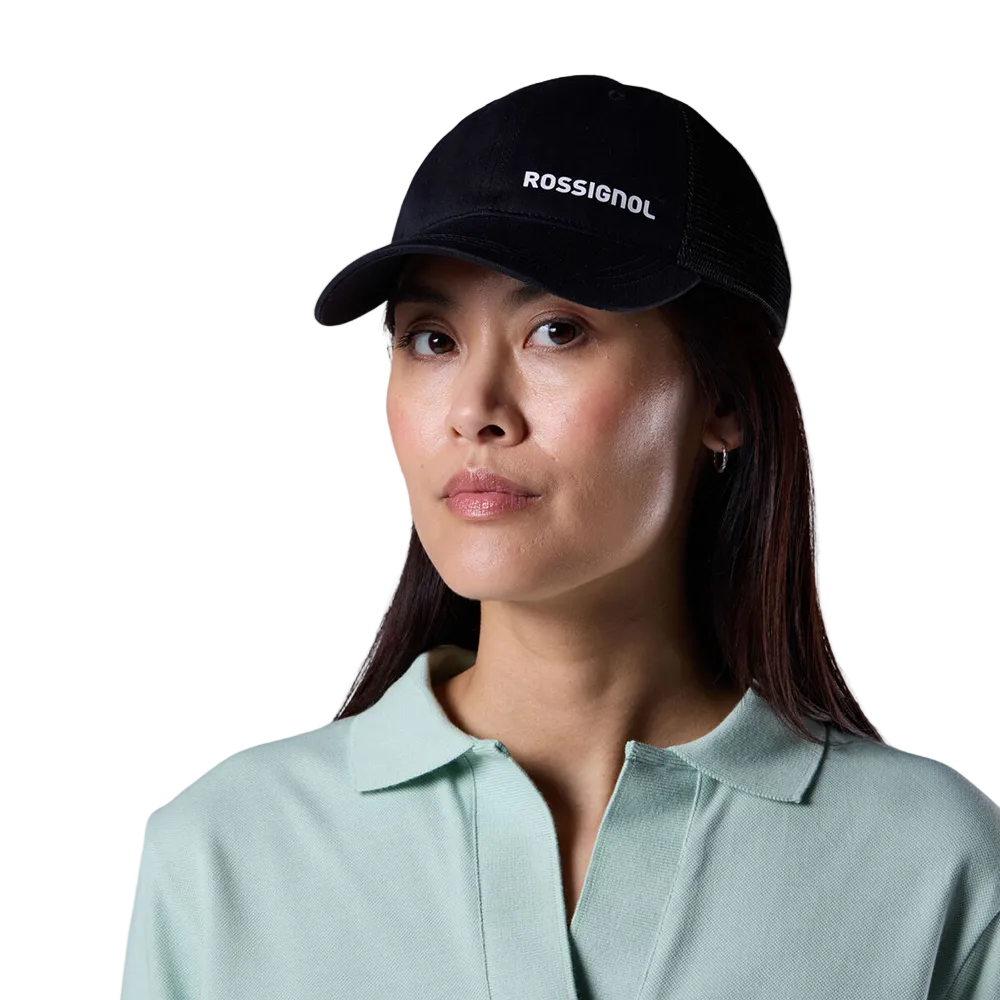 Front view of a black Rossignol Trucker Cap featuring a structured front panel, pre-curved visor, breathable rear mesh panels, and an adjustable snapback closure.