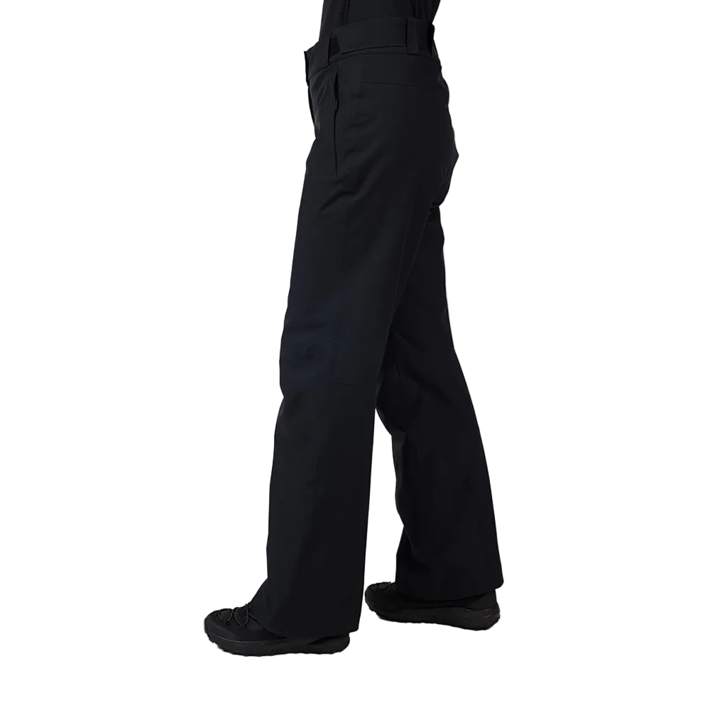 Side view of black Rossignol Women’s Insulated Ski Pants featuring waterproof membrane fabric, synthetic insulation, adjustable waist tabs, integrated boot gaiters, and reinforced hem scuff guards.