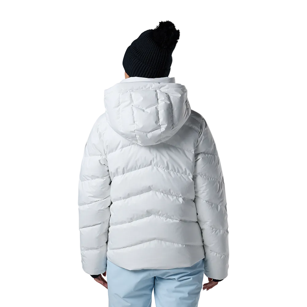 Rear view of a white Rossignol Women’s Wispile Ripstop Down Jacket featuring high-loft baffled down insulation, durable ripstop outer fabric, insulated hood, and zippered handwarmer pockets.