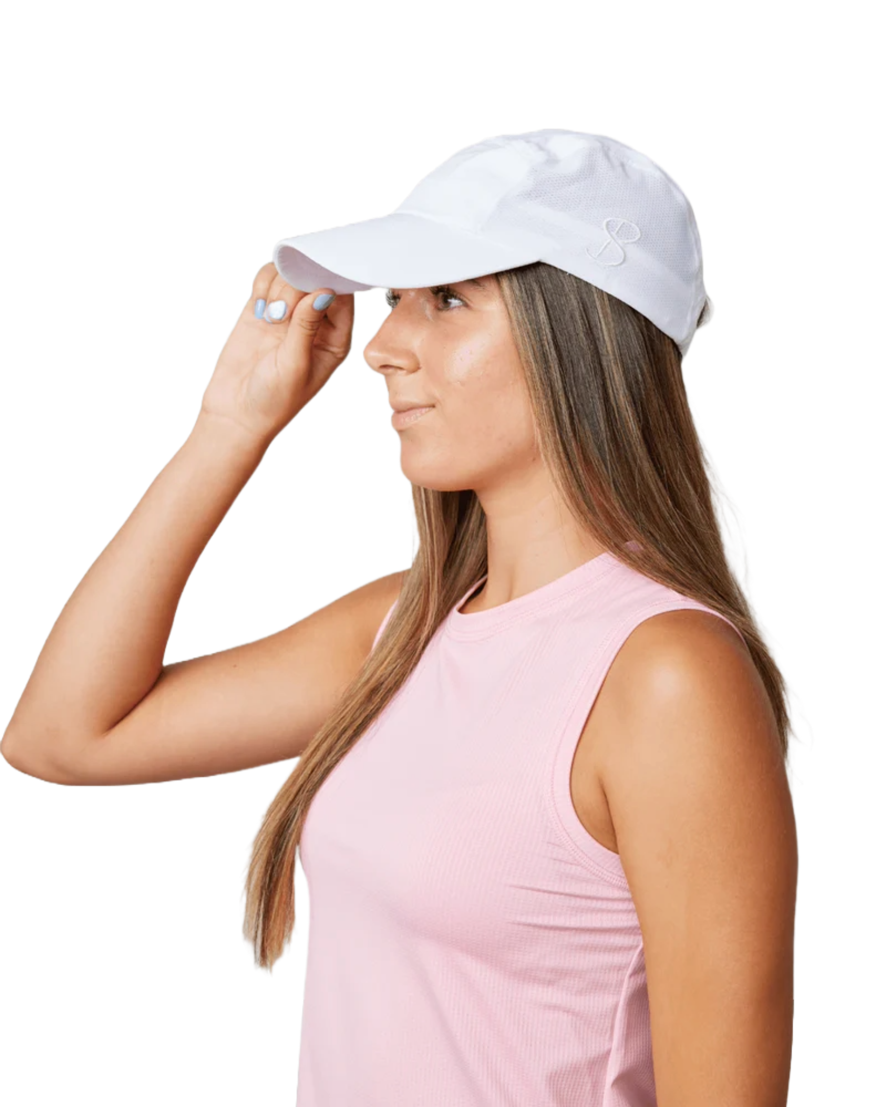 A woman wearing a white Sofibella Staples Snap Cap on a white background.