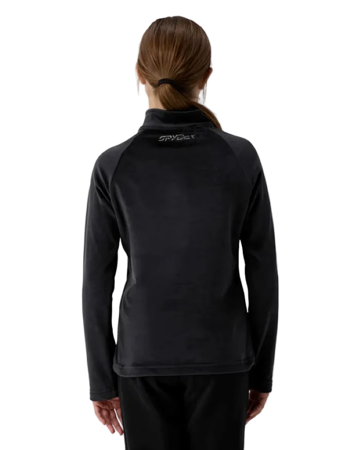 A girl wearing a Spyder Jr Girls’ Shimmer Bug 1/2 Zip Sweater featuring high-stretch velour fleece knit, YKK® reverse coil center front zipper, T-neck collar, and jeweled crystal logo.