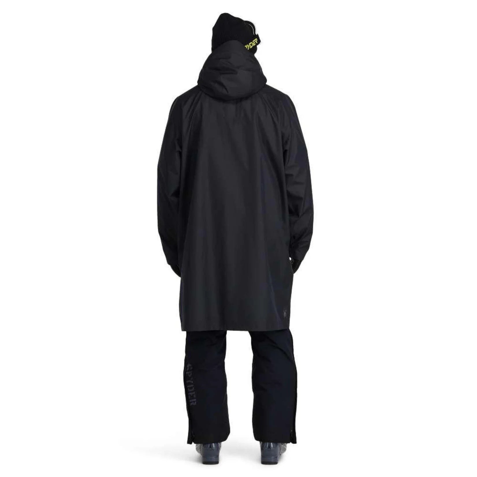 A man wearing a black Spyder Rain Shell Jacket that is waterproof and stretchable.